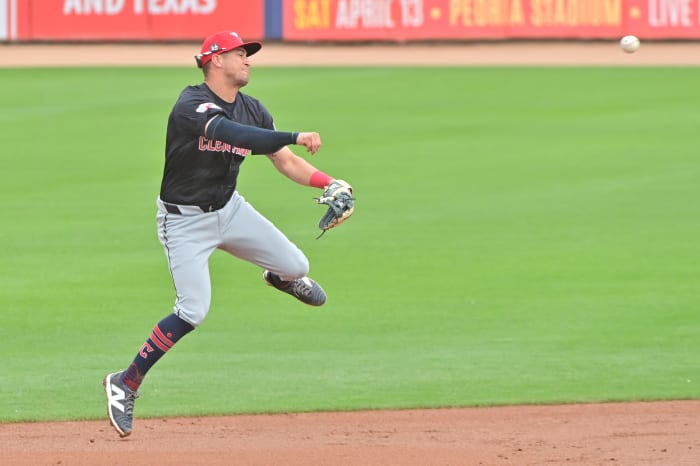 Feb 26, 2024; Peoria, Arizona, USA; Cleveland Guardians third baseman Tyler Freeman (2) throws to first base in the third inning against the San Diego Padres during a spring training game at Peoria Sports Complex. Mandatory Credit: Matt Kartozian-USA TODAY Sports